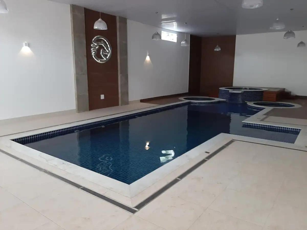 Agradavel Flat - Cavalinho Branco - Aguas De Lindoia Appartement Buitenkant foto